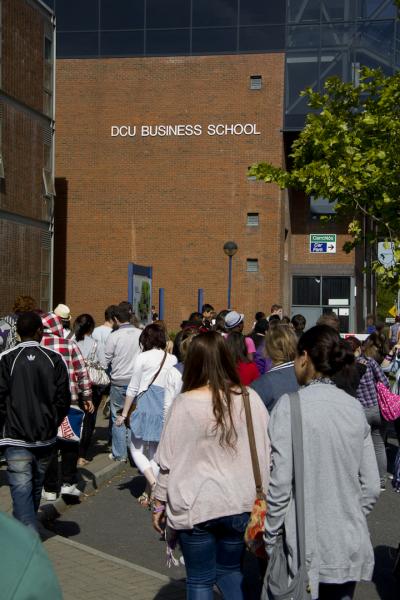 Group of students walking towards DCU Business School